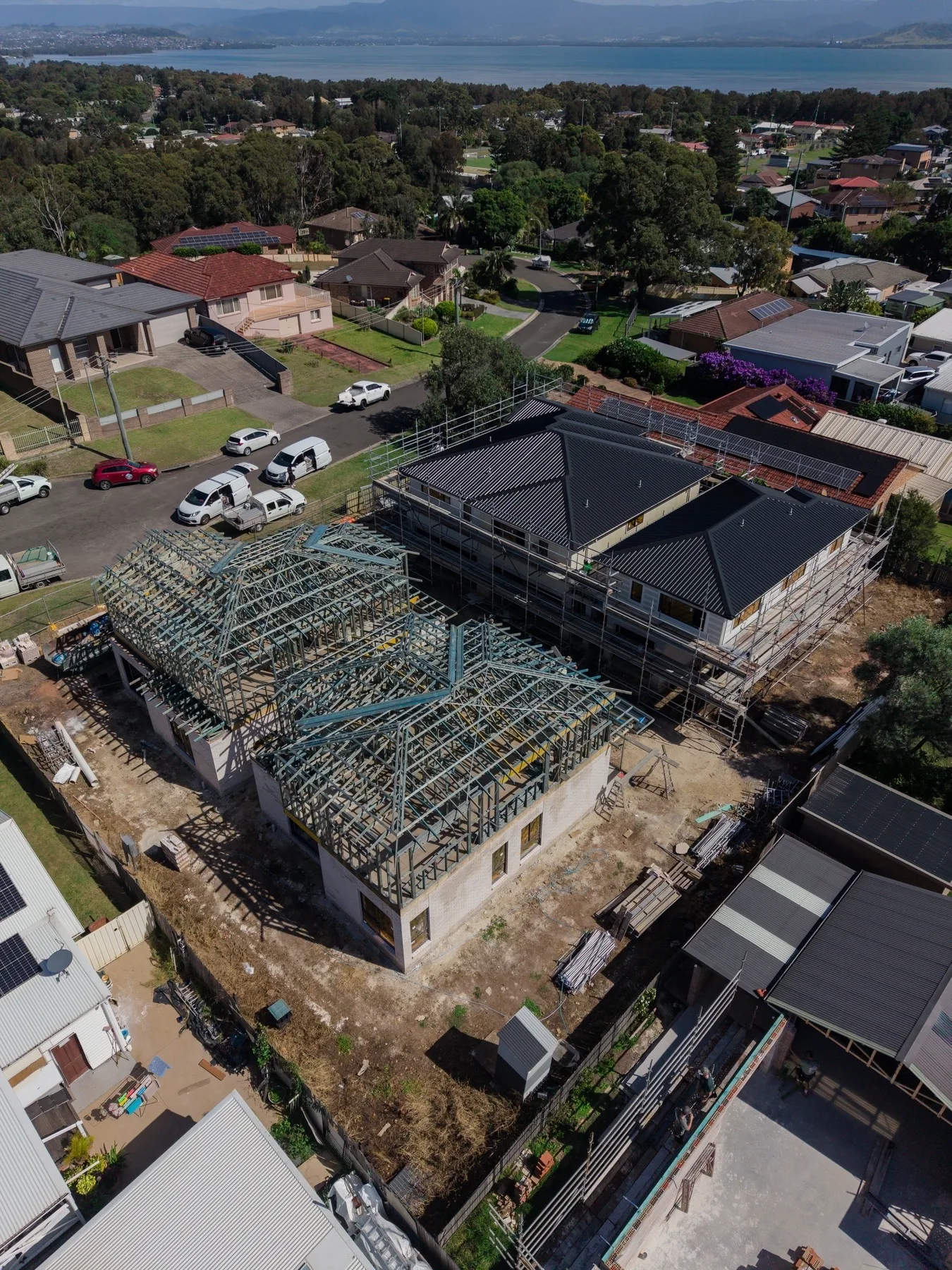 Aerial view of a large residential exterior painting project